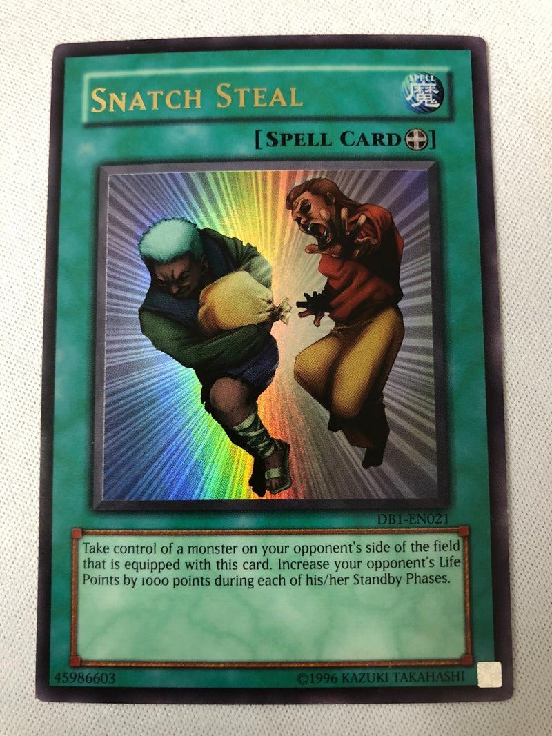 Yugioh Snatch Steal DB1-EN021 Ultra Rare Unlimited Near Mint