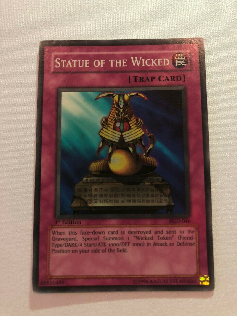 Yugioh Statue of the Wicked PGD-046 1st Edition Super Rare Near Mint